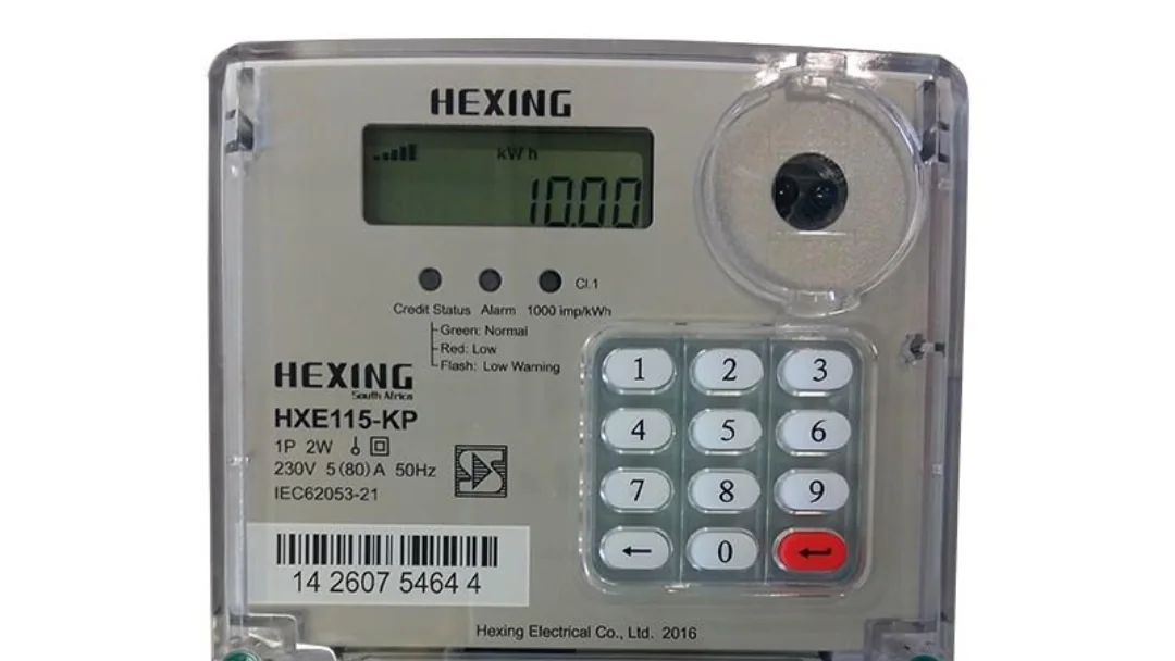 Close-up of a prepaid electricity meter with its display and keypad